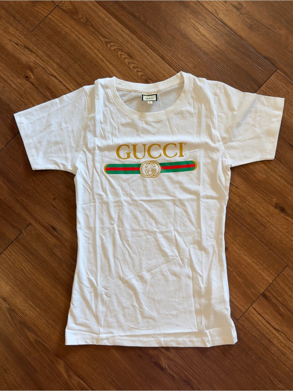 Gucci White Tee with Gold Logo and Green-Red Stripe
